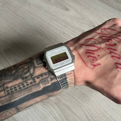Custom Casio F-91W Clear/Transparent digital watch featuring a Yellow gradient. Slim 8.5 mm profile, lightweight 21 g build and flexible bio-based resin band ensure lasting comfort. Includes alarm, stopwatch, and microlight function for everyday functionality.