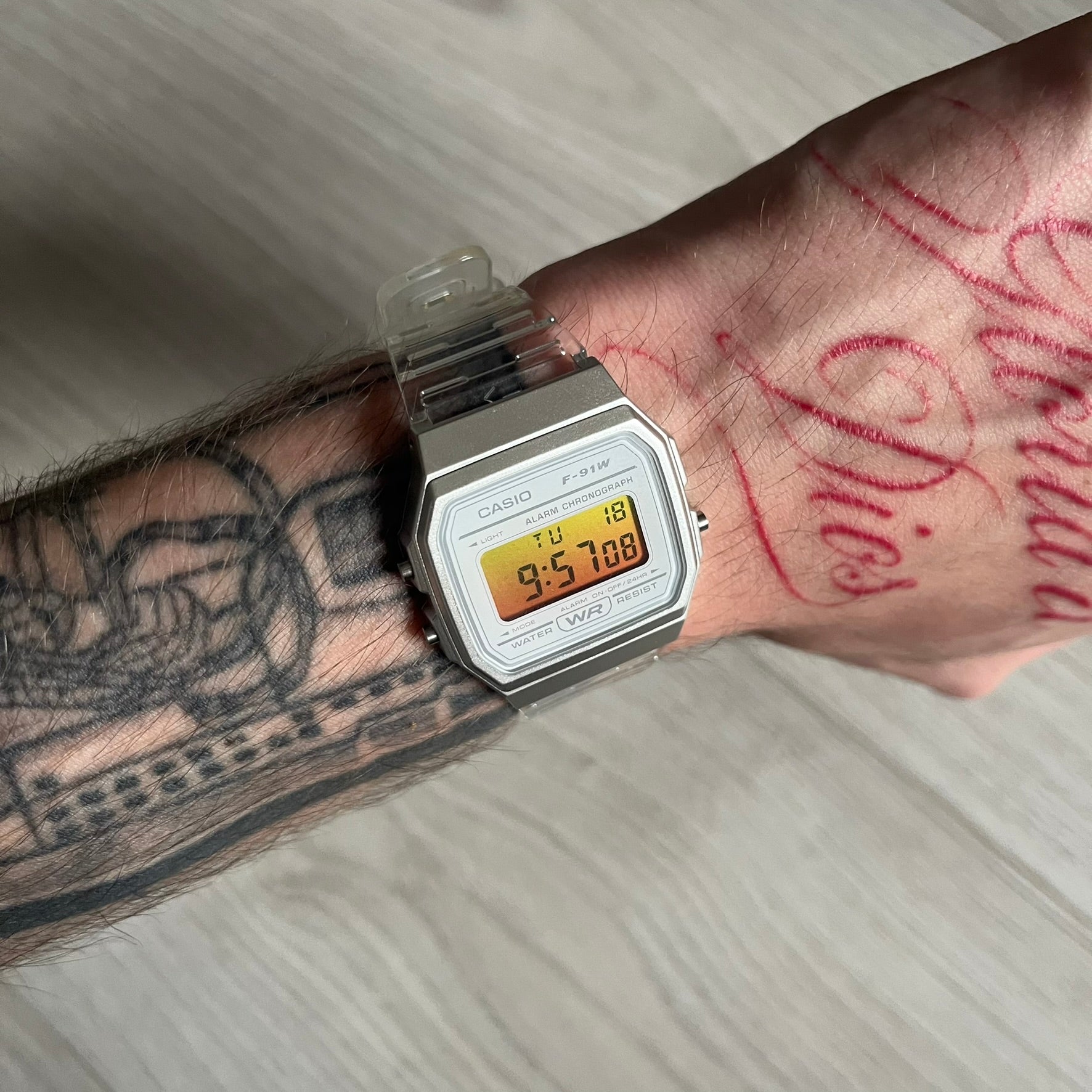 Custom Casio F-91W Clear/Transparent digital watch featuring a Yellow gradient. Slim 8.5 mm profile, lightweight 21 g build and flexible bio-based resin band ensure lasting comfort. Includes alarm, stopwatch, and microlight function for everyday functionality.
