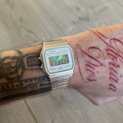 Custom Casio F-91W Clear/Transparent digital watch featuring a Holographic diamonds filter screen. Slim 8.5 mm profile, lightweight 21 g build and flexible bio-based resin band ensure lasting comfort. Includes alarm, stopwatch, and microlight function for everyday functionality.