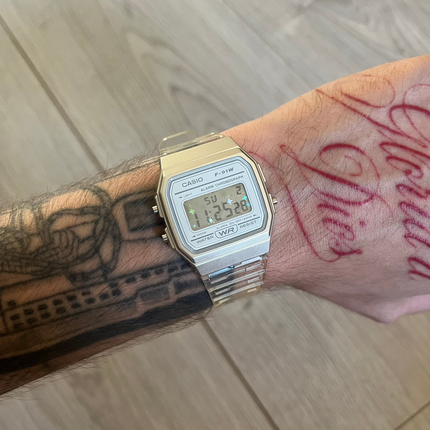 Custom Casio F-91W Clear/Transparent digital watch featuring a Holographic stars filter screen. Slim 8.5 mm profile, lightweight 21 g build and flexible bio-based resin band ensure lasting comfort. Includes alarm, stopwatch, and microlight function for everyday functionality.