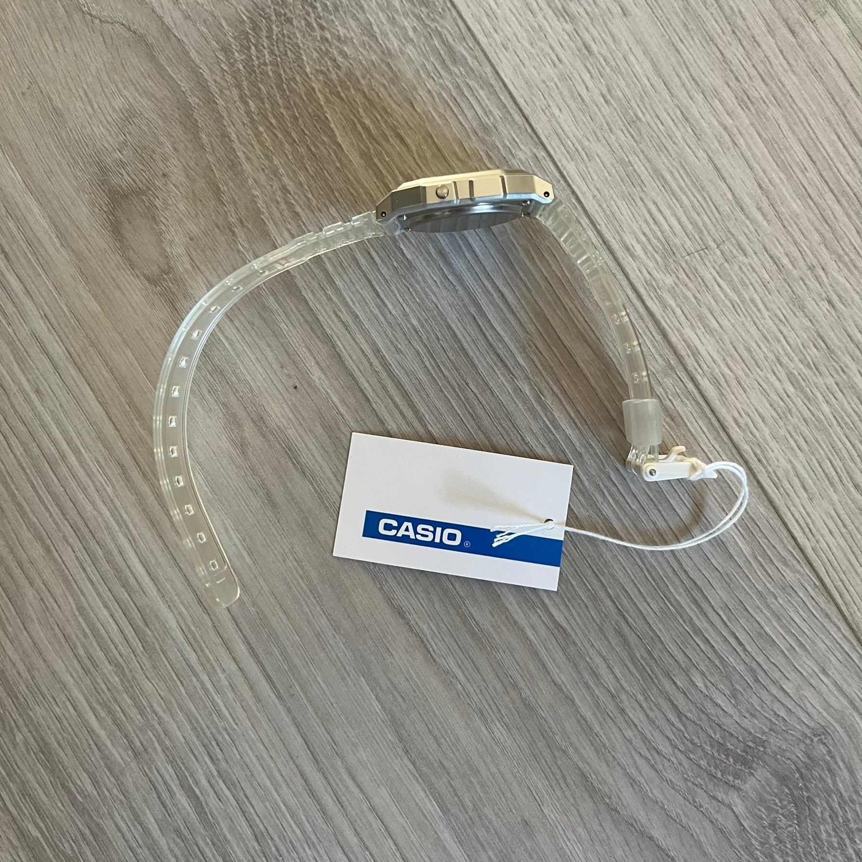 Custom Casio F-91W Clear/Transparent digital watch featuring a Holographic stars filter screen. Slim 8.5 mm profile, lightweight 21 g build and flexible bio-based resin band ensure lasting comfort. Includes alarm, stopwatch, and microlight function for everyday functionality.