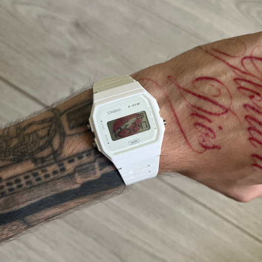 Custom Casio F-91W White digital watch featuring a Red Lips filter screen. Slim 8.5 mm profile, lightweight 21 g build and flexible bio-based resin band ensure lasting comfort. Includes alarm, stopwatch, and microlight function for everyday functionality.