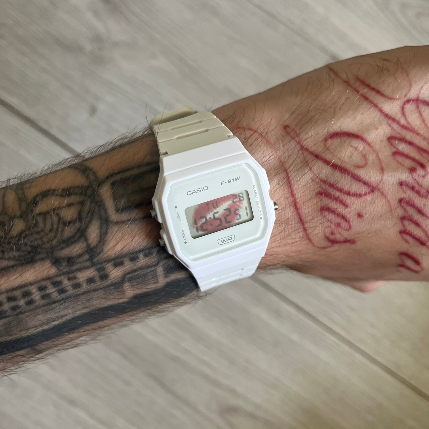 Custom Casio F-91W White digital watch featuring a Red Lips filter screen. Slim 8.5 mm profile, lightweight 21 g build and flexible bio-based resin band ensure lasting comfort. Includes alarm, stopwatch, and microlight function for everyday functionality.