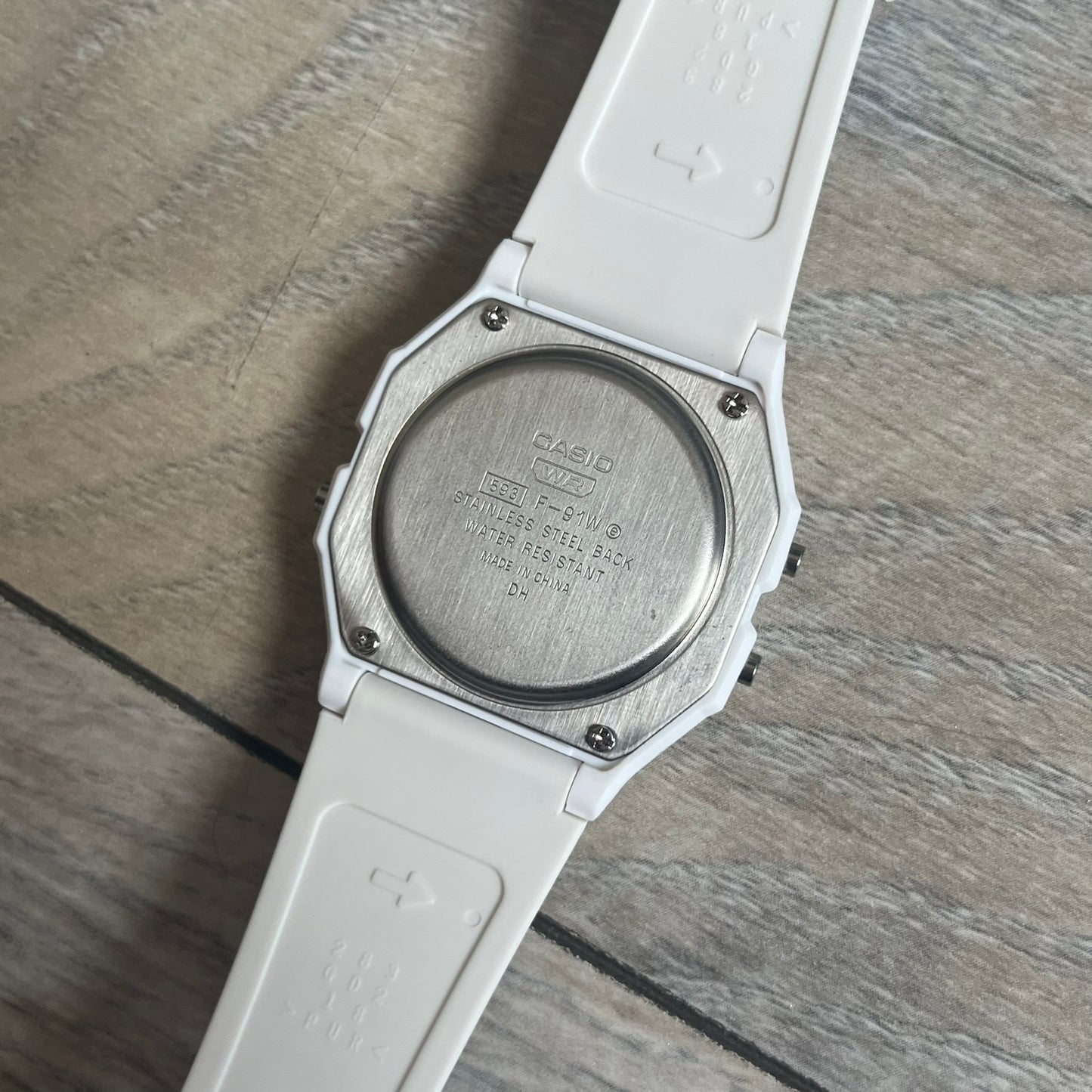 Custom Casio F-91W White digital watch featuring a Gradient multicolor filter screen. Slim 8.5 mm profile, lightweight 21 g build and flexible bio-based resin band ensure lasting comfort. Includes alarm, stopwatch, and microlight function for everyday functionality