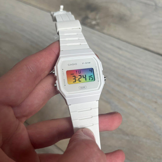 Custom Casio F-91W White digital watch featuring a Gradient multicolor filter screen. Slim 8.5 mm profile, lightweight 21 g build and flexible bio-based resin band ensure lasting comfort. Includes alarm, stopwatch, and microlight function for everyday functionality