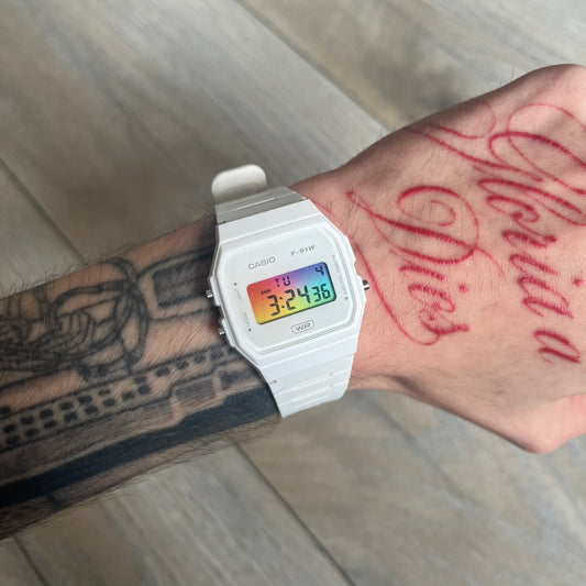 Custom Casio F-91W White digital watch featuring a Gradient multicolor filter screen. Slim 8.5 mm profile, lightweight 21 g build and flexible bio-based resin band ensure lasting comfort. Includes alarm, stopwatch, and microlight function for everyday functionality