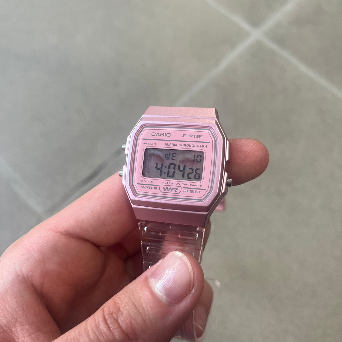 Custom Casio F-91W Pink digital watch featuring a Anime Eyes filter screen. Slim 8.5 mm profile, lightweight 21 g build and flexible bio-based resin band ensure lasting comfort. Includes alarm, stopwatch, and microlight function for everyday functionality.