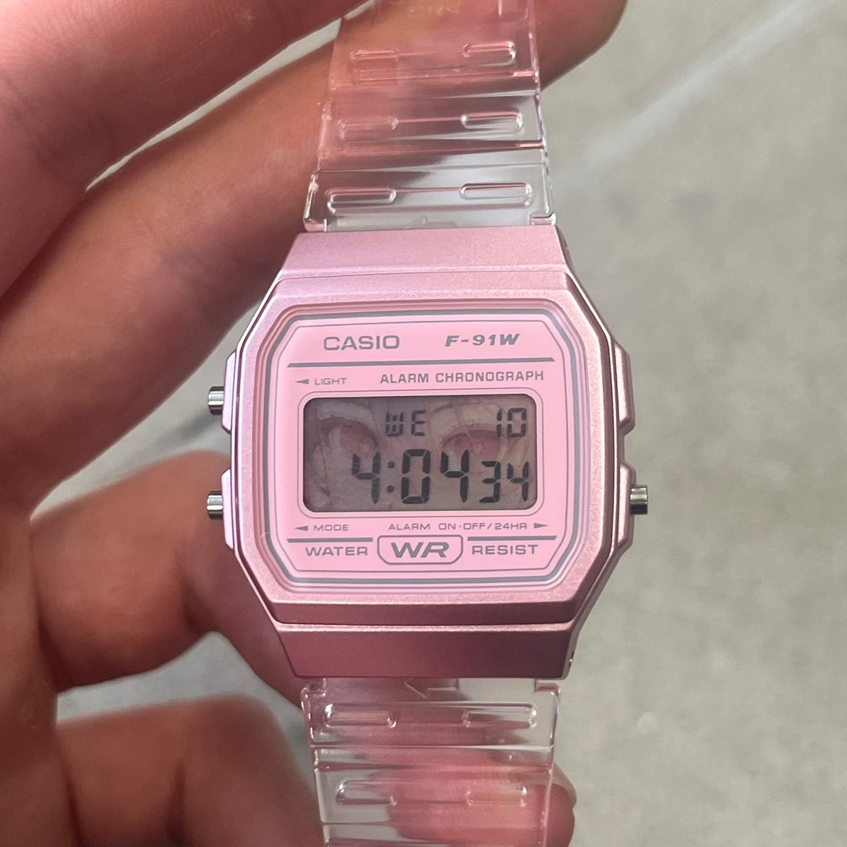 Custom Casio F-91W Pink digital watch featuring a Anime Eyes filter screen. Slim 8.5 mm profile, lightweight 21 g build and flexible bio-based resin band ensure lasting comfort. Includes alarm, stopwatch, and microlight function for everyday functionality.