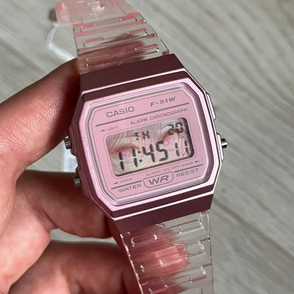 Custom Casio F-91W Pink digital watch featuring a Anime Eyes filter screen. Slim 8.5 mm profile, lightweight 21 g build and flexible bio-based resin band ensure lasting comfort. Includes alarm, stopwatch, and microlight function for everyday functionality.