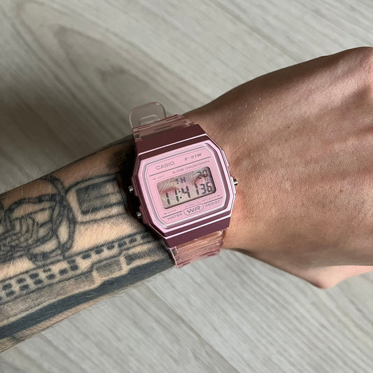 Custom Casio F-91W Pink digital watch featuring a Anime Eyes filter screen. Slim 8.5 mm profile, lightweight 21 g build and flexible bio-based resin band ensure lasting comfort. Includes alarm, stopwatch, and microlight function for everyday functionality.