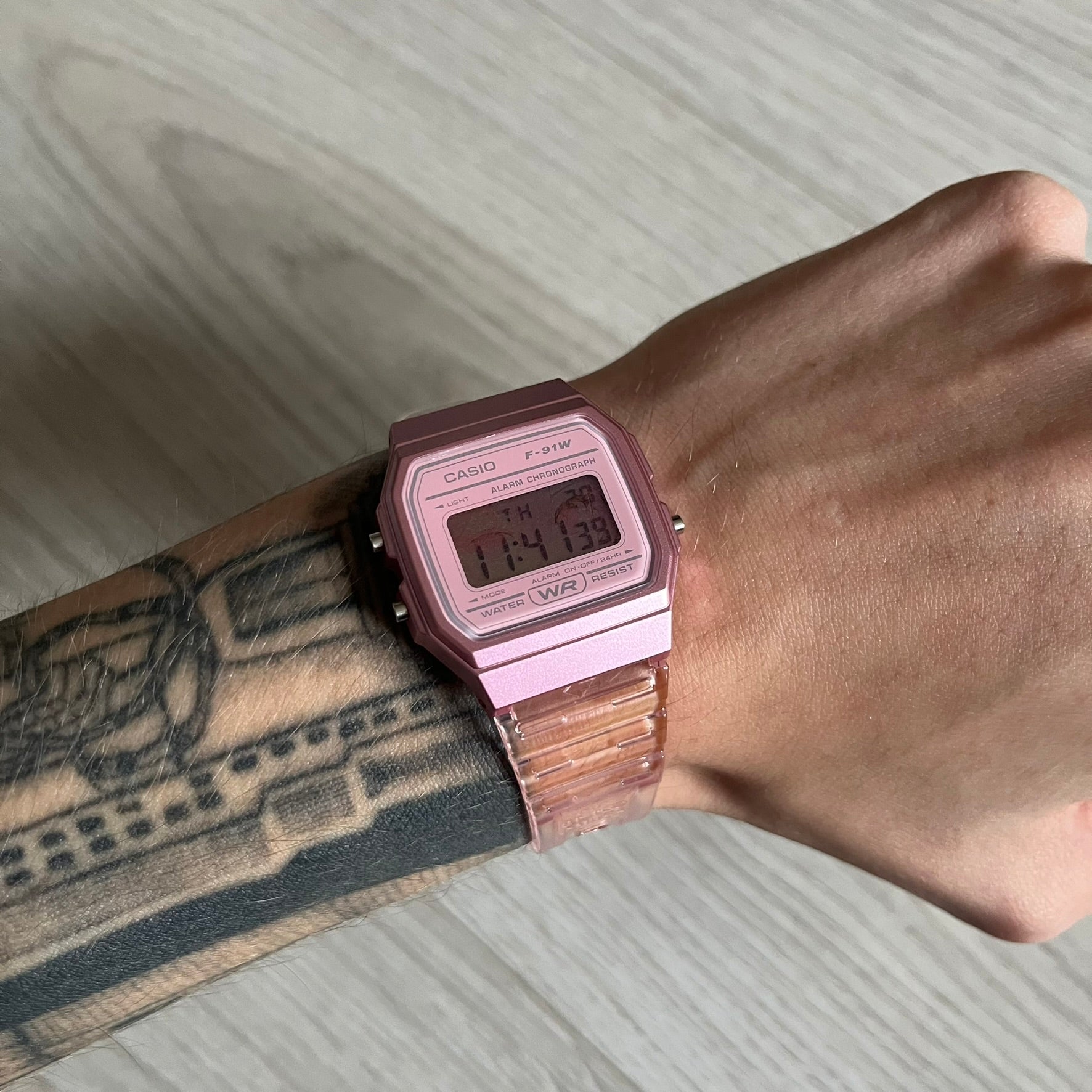 Custom Casio F-91W Pink digital watch featuring a Anime Eyes filter screen. Slim 8.5 mm profile, lightweight 21 g build and flexible bio-based resin band ensure lasting comfort. Includes alarm, stopwatch, and microlight function for everyday functionality.