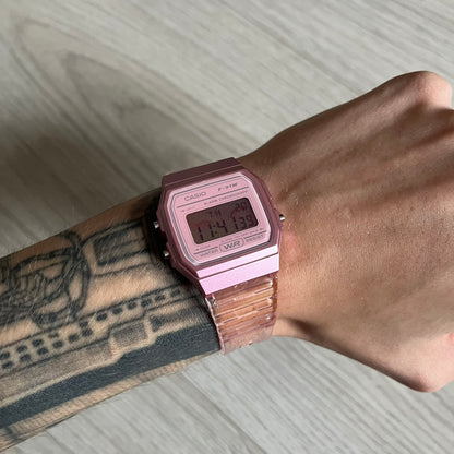 Custom Casio F-91W Pink digital watch featuring a Anime Eyes filter screen. Slim 8.5 mm profile, lightweight 21 g build and flexible bio-based resin band ensure lasting comfort. Includes alarm, stopwatch, and microlight function for everyday functionality.