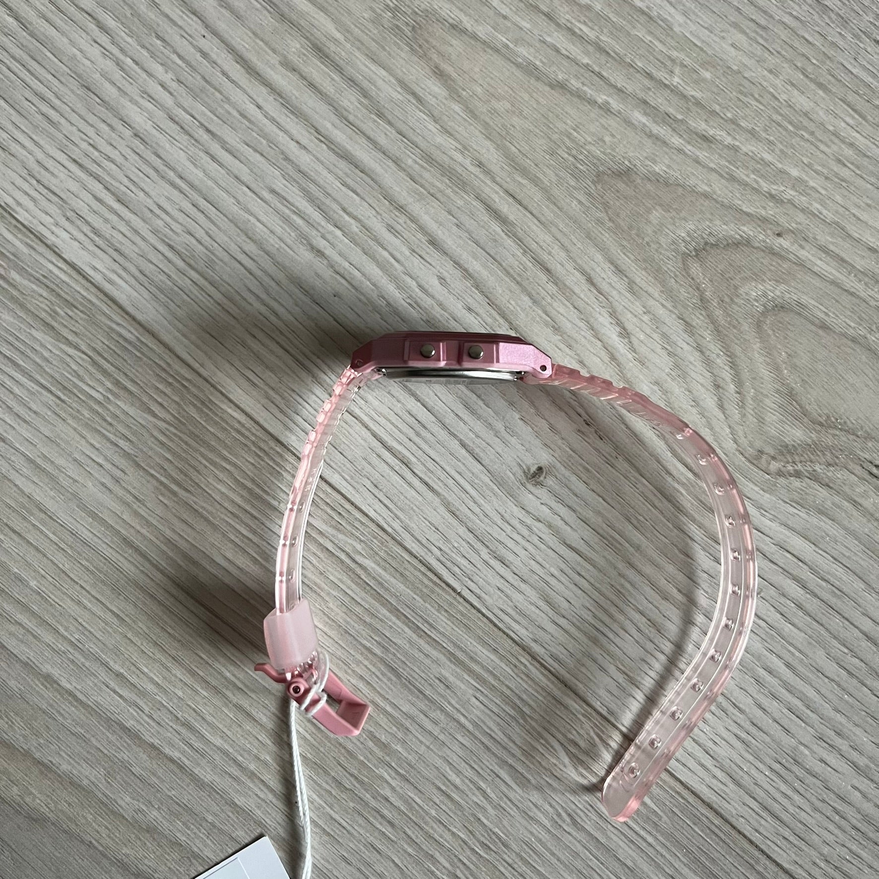 Custom Casio F-91W Pink digital watch featuring a Anime Eyes filter screen. Slim 8.5 mm profile, lightweight 21 g build and flexible bio-based resin band ensure lasting comfort. Includes alarm, stopwatch, and microlight function for everyday functionality.