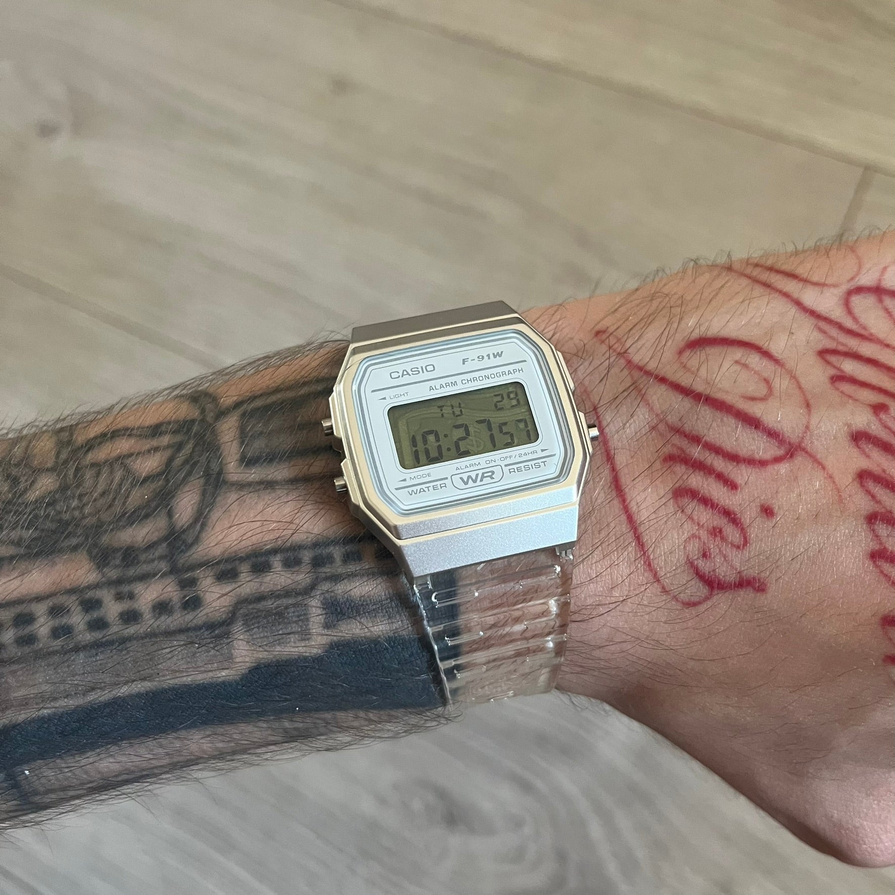 Custom Casio F-91W Clear/Transparent digital watch featuring a Money graphic filter screen. Slim 8.5 mm profile, lightweight 21 g build and flexible bio-based resin band ensure lasting comfort. Includes alarm, stopwatch, and microlight function for everyday functionality.