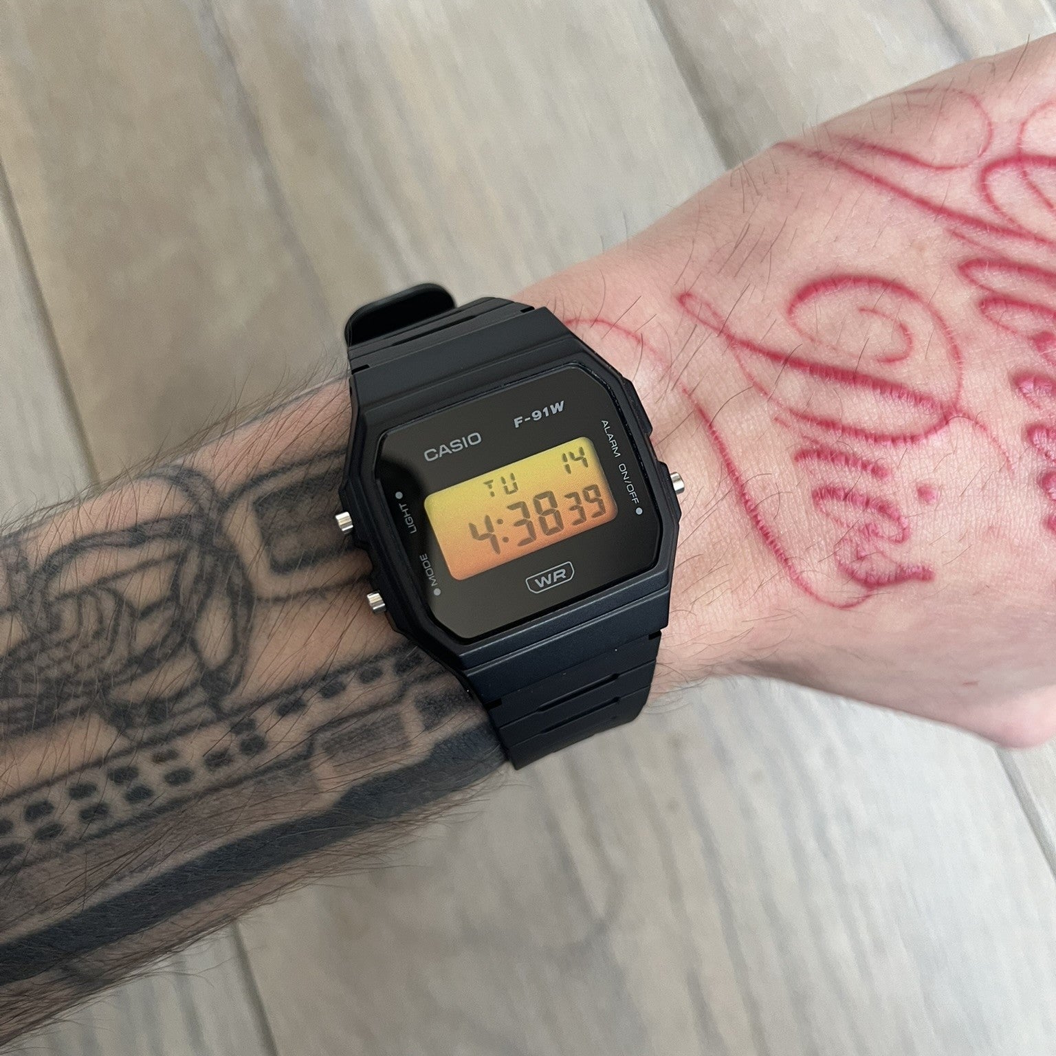 Custom Casio F-91W Black digital watch featuring a Gradient Yellow &amp; Orange filter screen. Slim 8.5 mm profile, lightweight 21 g build and flexible bio-based resin band ensure lasting comfort. Includes alarm, stopwatch, and microlight function for everyday functionality.