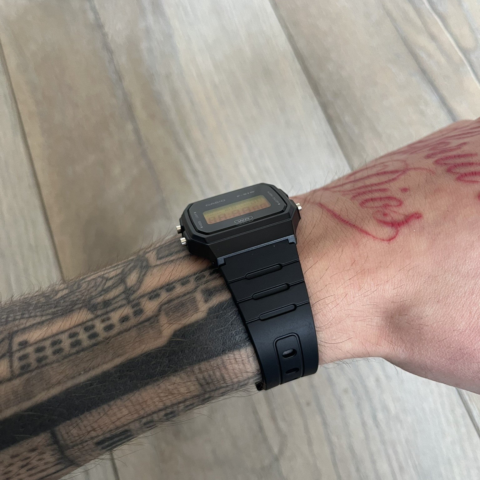 Custom Casio F-91W Black digital watch featuring a Gradient Yellow &amp; Orange filter screen. Slim 8.5 mm profile, lightweight 21 g build and flexible bio-based resin band ensure lasting comfort. Includes alarm, stopwatch, and microlight function for everyday functionality.
