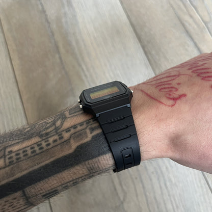 Custom Casio F-91W Black digital watch featuring a Gradient Yellow &amp; Orange filter screen. Slim 8.5 mm profile, lightweight 21 g build and flexible bio-based resin band ensure lasting comfort. Includes alarm, stopwatch, and microlight function for everyday functionality.