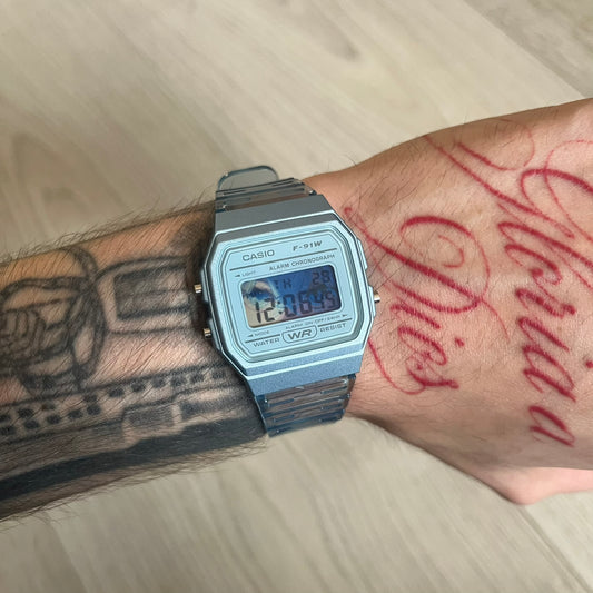 Custom Casio F-91W Blue digital watch featuring a Blue Anime eyes filter screen. Slim 8.5 mm profile, lightweight 21 g build and flexible bio-based resin band ensure lasting comfort. Includes alarm, stopwatch, and microlight function for everyday functionality.