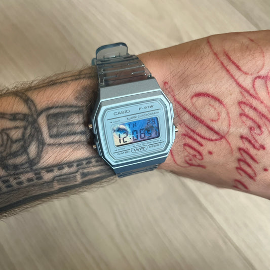 Custom Casio F-91W Blue digital watch featuring a Blue Anime eyes filter screen. Slim 8.5 mm profile, lightweight 21 g build and flexible bio-based resin band ensure lasting comfort. Includes alarm, stopwatch, and microlight function for everyday functionality.