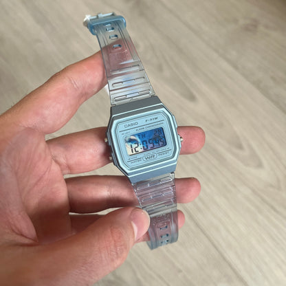 Custom Casio F-91W Blue digital watch featuring a Blue Anime eyes filter screen. Slim 8.5 mm profile, lightweight 21 g build and flexible bio-based resin band ensure lasting comfort. Includes alarm, stopwatch, and microlight function for everyday functionality.