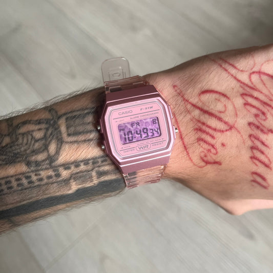 Custom Casio F-91W Pink digital watch featuring a Pink Leopard print filter screen. Slim 8.5 mm profile, lightweight 21 g build and flexible bio-based resin band ensure lasting comfort. Includes alarm, stopwatch, and microlight function for everyday functionality.