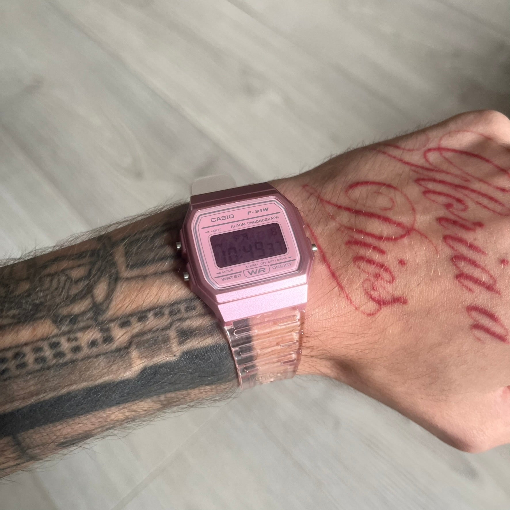 Custom Casio F-91W Pink digital watch featuring a Pink Leopard print filter screen. Slim 8.5 mm profile, lightweight 21 g build and flexible bio-based resin band ensure lasting comfort. Includes alarm, stopwatch, and microlight function for everyday functionality.