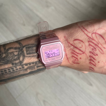 Custom Casio F-91W Pink digital watch featuring a Pink Leopard print filter screen. Slim 8.5 mm profile, lightweight 21 g build and flexible bio-based resin band ensure lasting comfort. Includes alarm, stopwatch, and microlight function for everyday functionality.