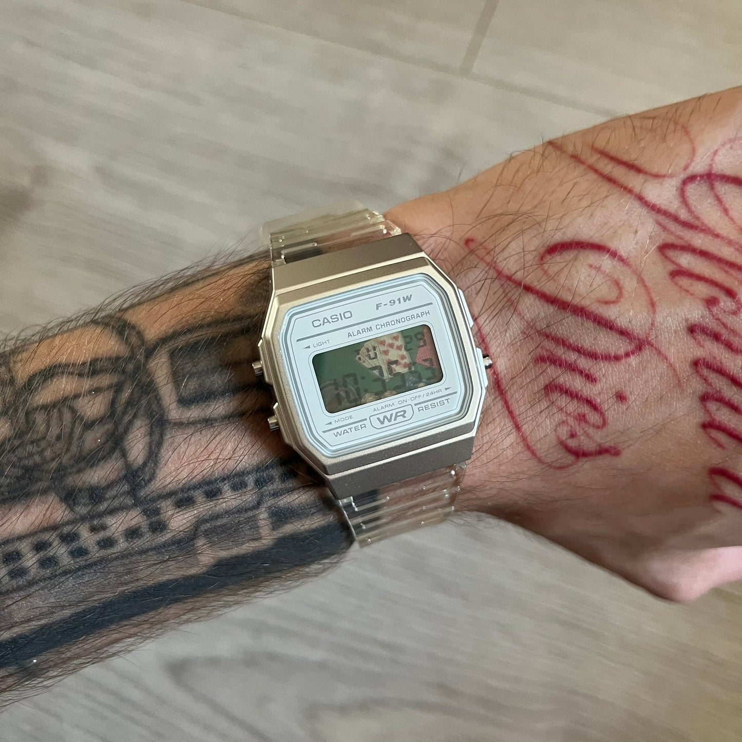 Custom Casio F-91W Clear/Transparent digital watch featuring a Poker table graphic filter screen. Slim 8.5 mm profile, lightweight 21 g build and flexible bio-based resin band ensure lasting comfort. Includes alarm, stopwatch, and microlight function for everyday functionality.
