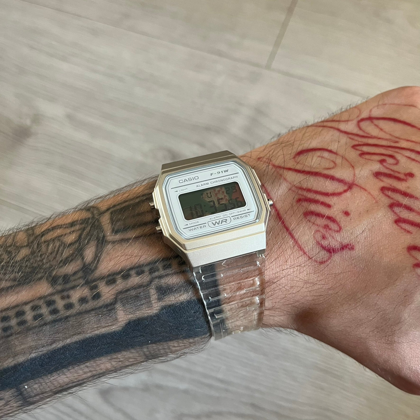 Custom Casio F-91W Clear/Transparent digital watch featuring a Poker table graphic filter screen. Slim 8.5 mm profile, lightweight 21 g build and flexible bio-based resin band ensure lasting comfort. Includes alarm, stopwatch, and microlight function for everyday functionality.