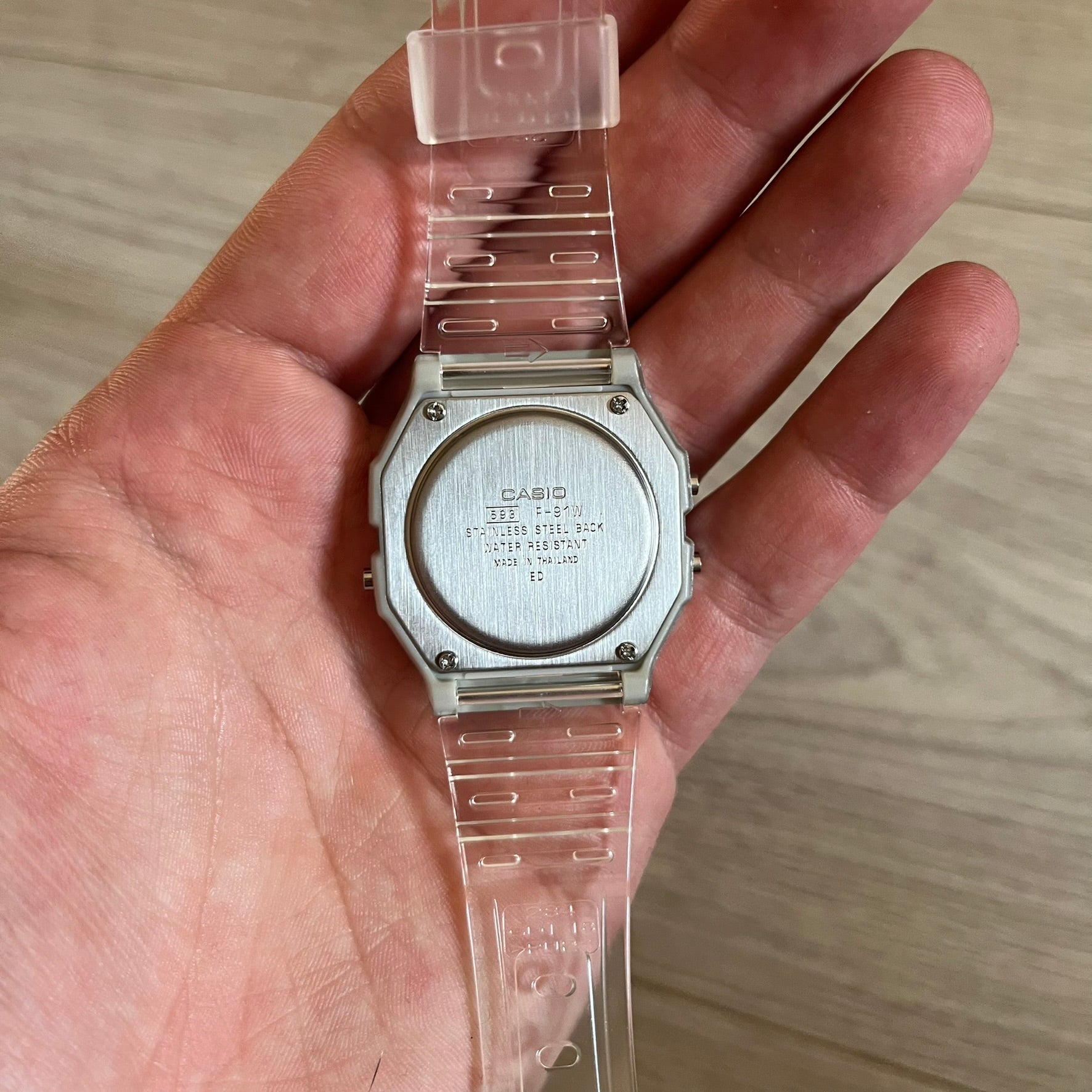 Custom Casio F-91W Clear/Transparent digital watch featuring a Poker table graphic filter screen. Slim 8.5 mm profile, lightweight 21 g build and flexible bio-based resin band ensure lasting comfort. Includes alarm, stopwatch, and microlight function for everyday functionality.