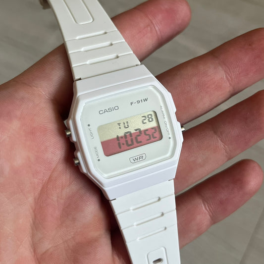 Custom Casio F-91W White digital watch featuring a Poland flag filter screen. Slim 8.5 mm profile, lightweight 21 g build and flexible bio-based resin band ensure lasting comfort. Includes alarm, stopwatch, and microlight function for everyday functionality.