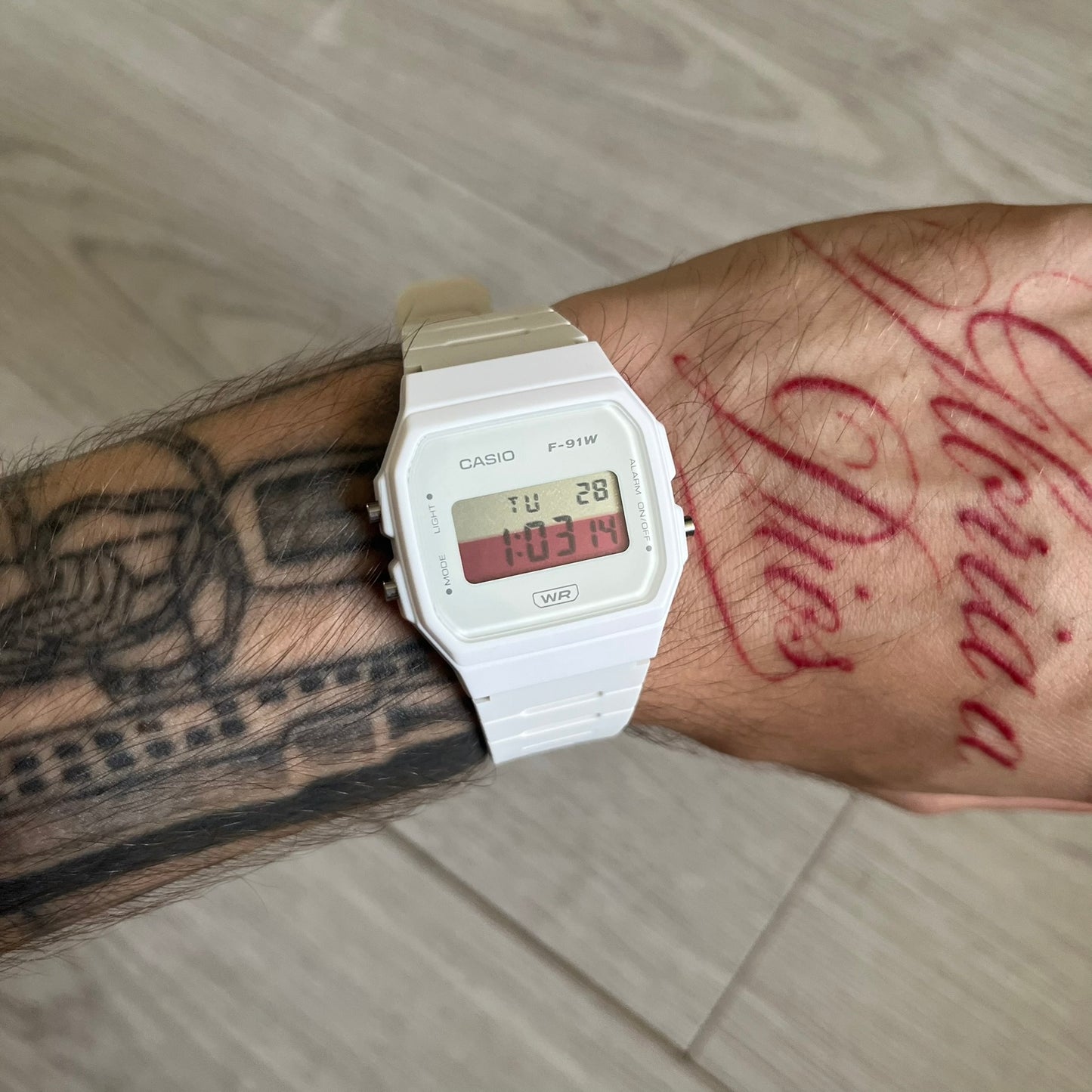 Custom Casio F-91W White digital watch featuring a Poland flag filter screen. Slim 8.5 mm profile, lightweight 21 g build and flexible bio-based resin band ensure lasting comfort. Includes alarm, stopwatch, and microlight function for everyday functionality.