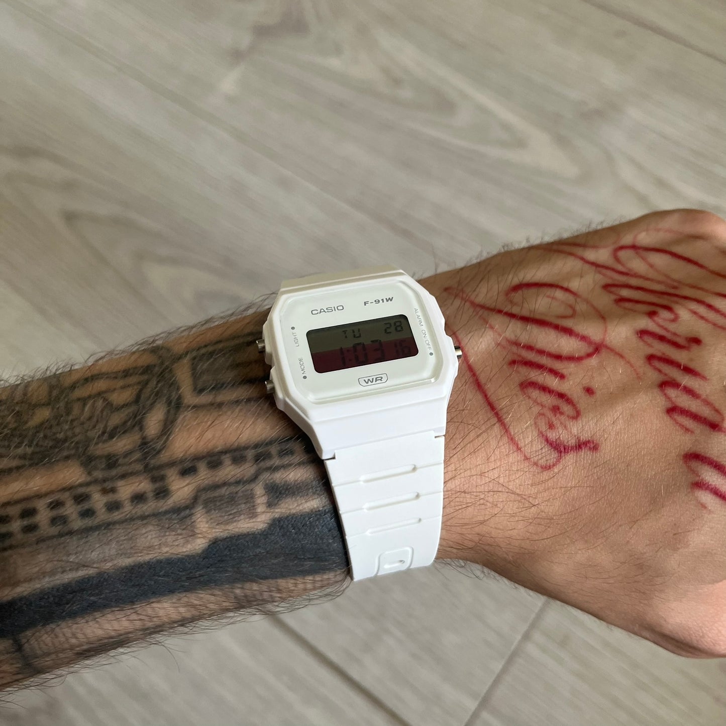 Custom Casio F-91W White digital watch featuring a Poland flag filter screen. Slim 8.5 mm profile, lightweight 21 g build and flexible bio-based resin band ensure lasting comfort. Includes alarm, stopwatch, and microlight function for everyday functionality.