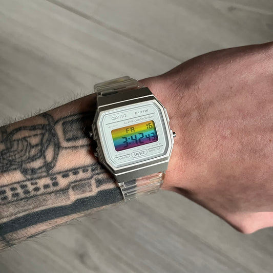 Custom Casio F-91W Clear/Transparent digital watch featuring a rainbow filter screen. Slim 8.5 mm profile, lightweight 21 g build and flexible bio-based resin band ensure lasting comfort. Includes alarm, stopwatch, and microlight function for everyday functionality.