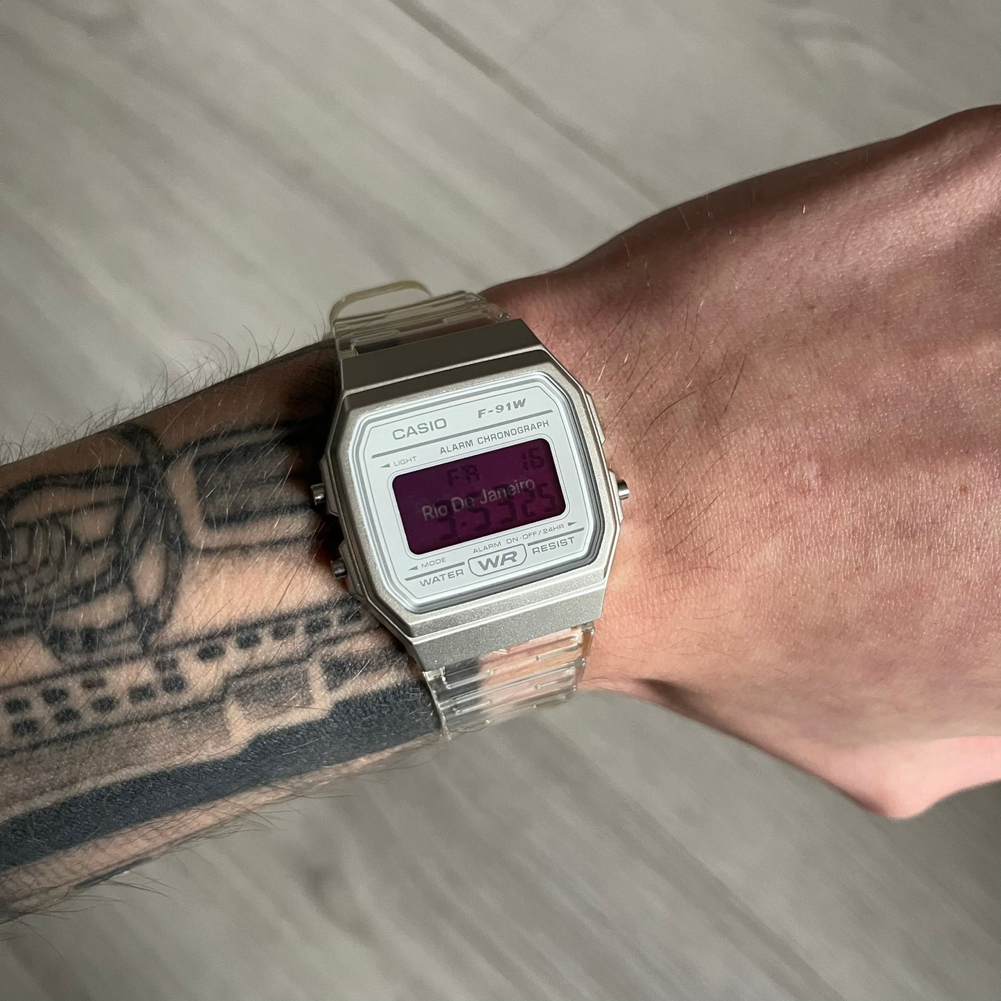 Custom Casio F-91W Clear/Transparent digital watch featuring a Rio De Janeiro filter screen. Slim 8.5 mm profile, lightweight 21 g build and flexible bio-based resin band ensure lasting comfort. Includes alarm, stopwatch, and microlight function for everyday functionality.