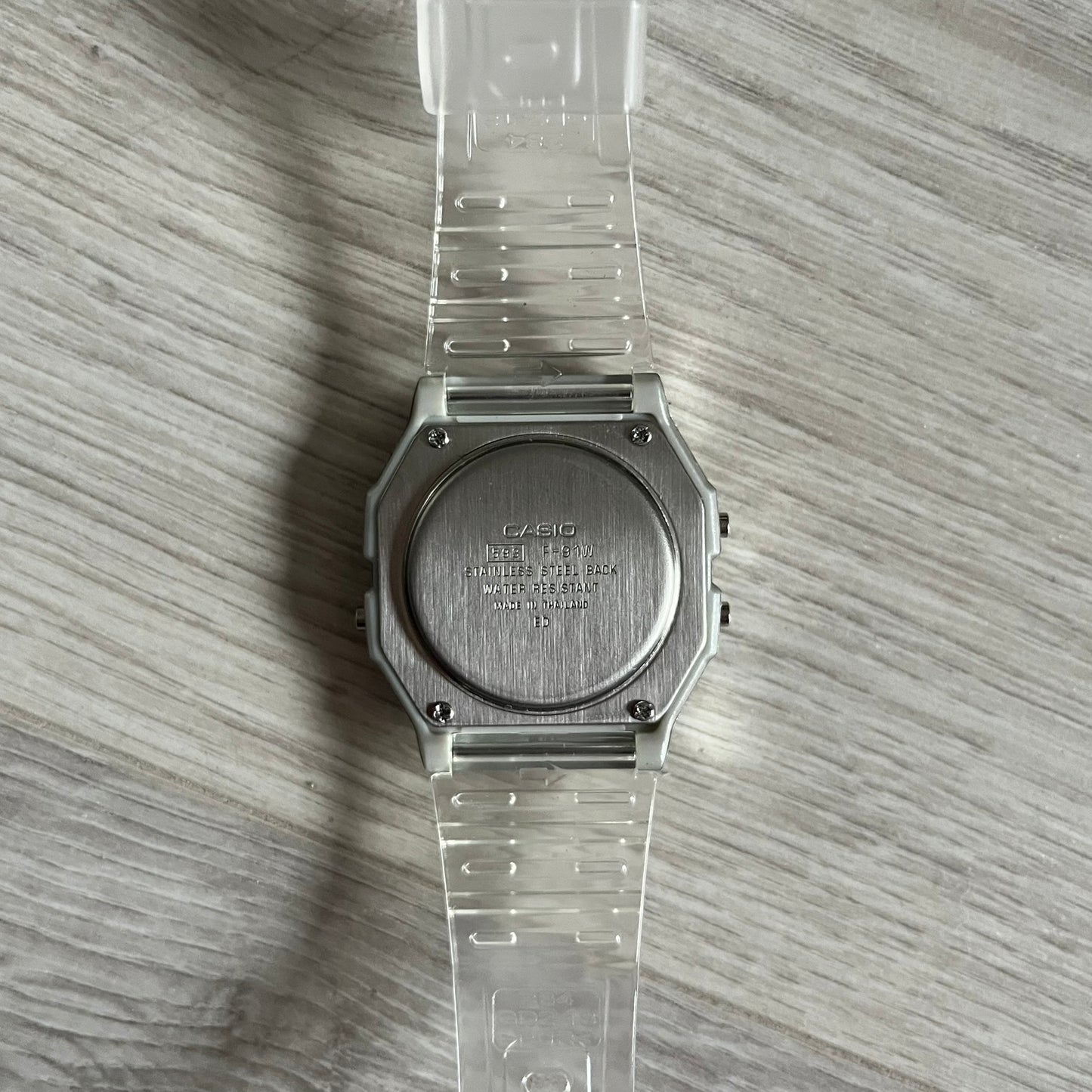 Custom Casio F-91W Clear/Transparent digital watch featuring a Rio De Janeiro filter screen. Slim 8.5 mm profile, lightweight 21 g build and flexible bio-based resin band ensure lasting comfort. Includes alarm, stopwatch, and microlight function for everyday functionality.