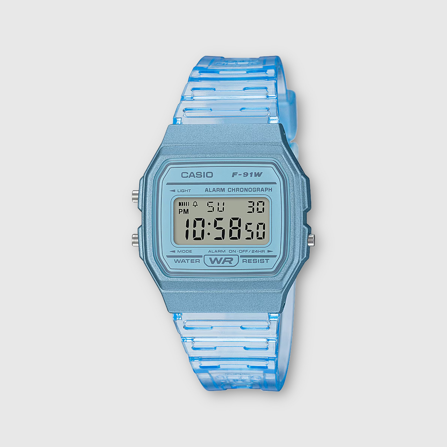 Blue digital Casio watch on a light gray background