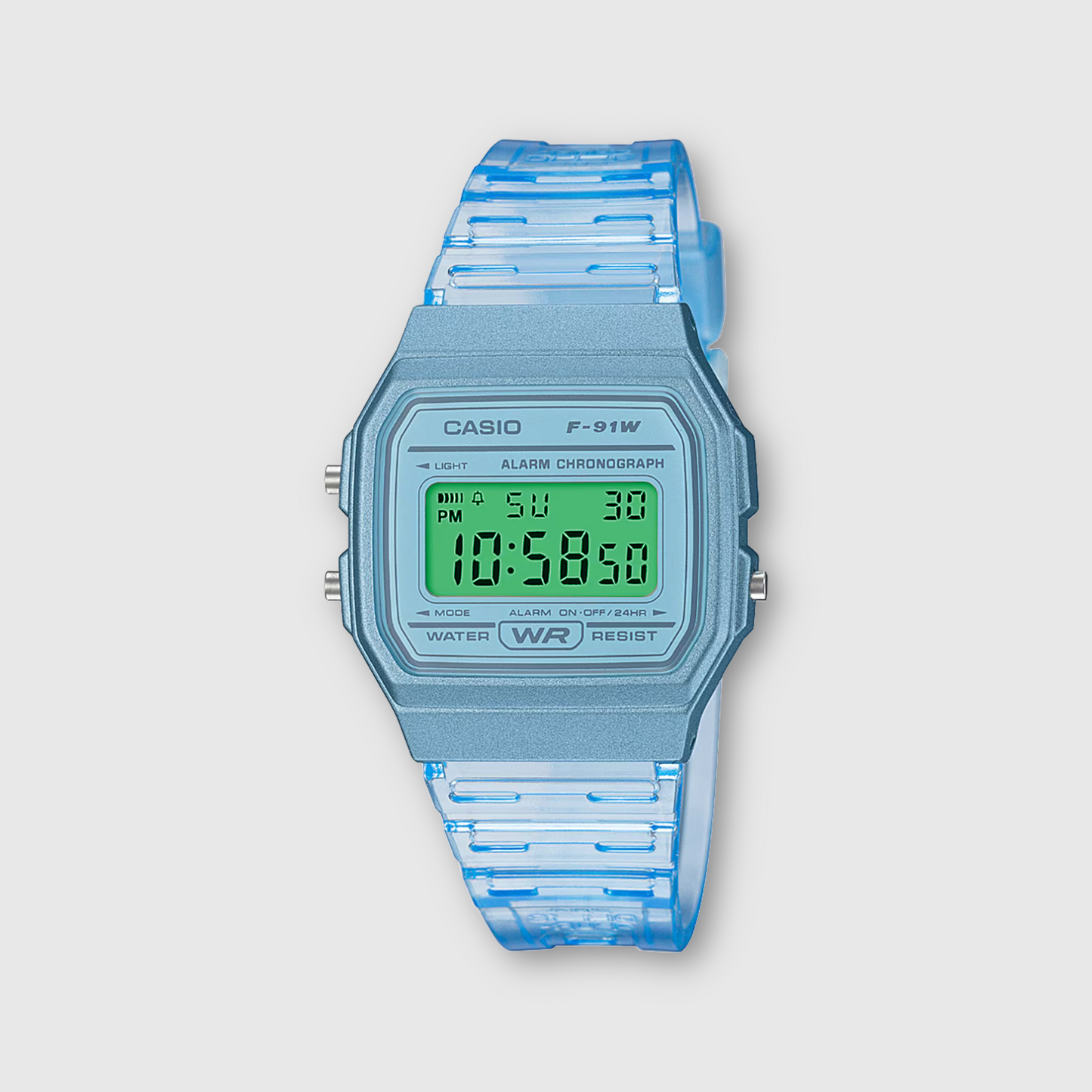 Casio digital watch with blue strap on a light gray background
