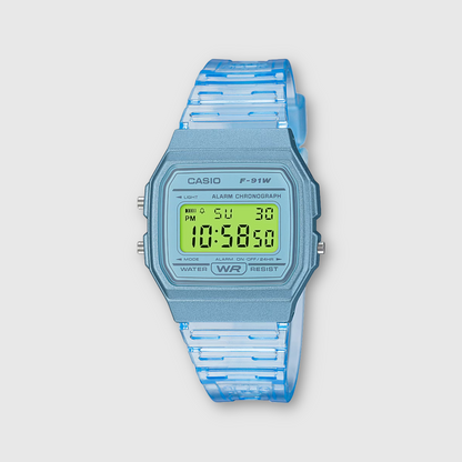 Blue digital watch with a clear strap on a light gray background