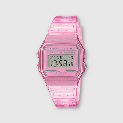 Pink Casio digital watch on a light gray background