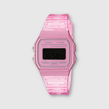 Pink Casio digital watch on a light gray background