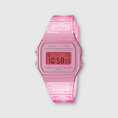 Pink Casio digital watch on a light gray background