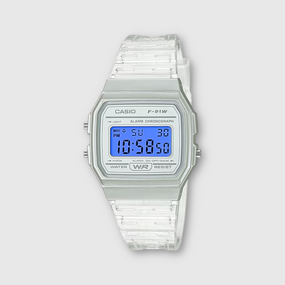 Casio digital watch with clear strap on a light gray background