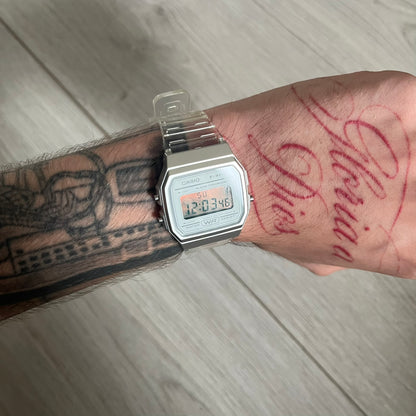 Custom Casio F-91W Clear/Transparent digital watch featuring a Silver reflective filter screen. Slim 8.5 mm profile, lightweight 21 g build and flexible bio-based resin band ensure lasting comfort. Includes alarm, stopwatch, and microlight function for everyday functionality.