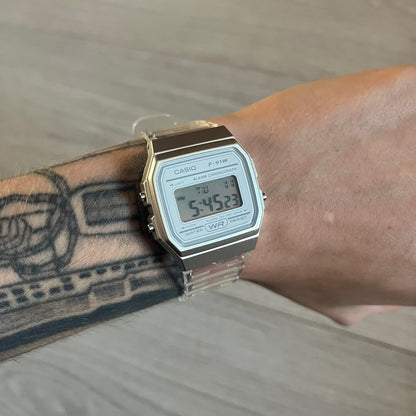 Custom Casio F-91W Clear/Transparent digital watch featuring a Silver reflective filter screen. Slim 8.5 mm profile, lightweight 21 g build and flexible bio-based resin band ensure lasting comfort. Includes alarm, stopwatch, and microlight function for everyday functionality.