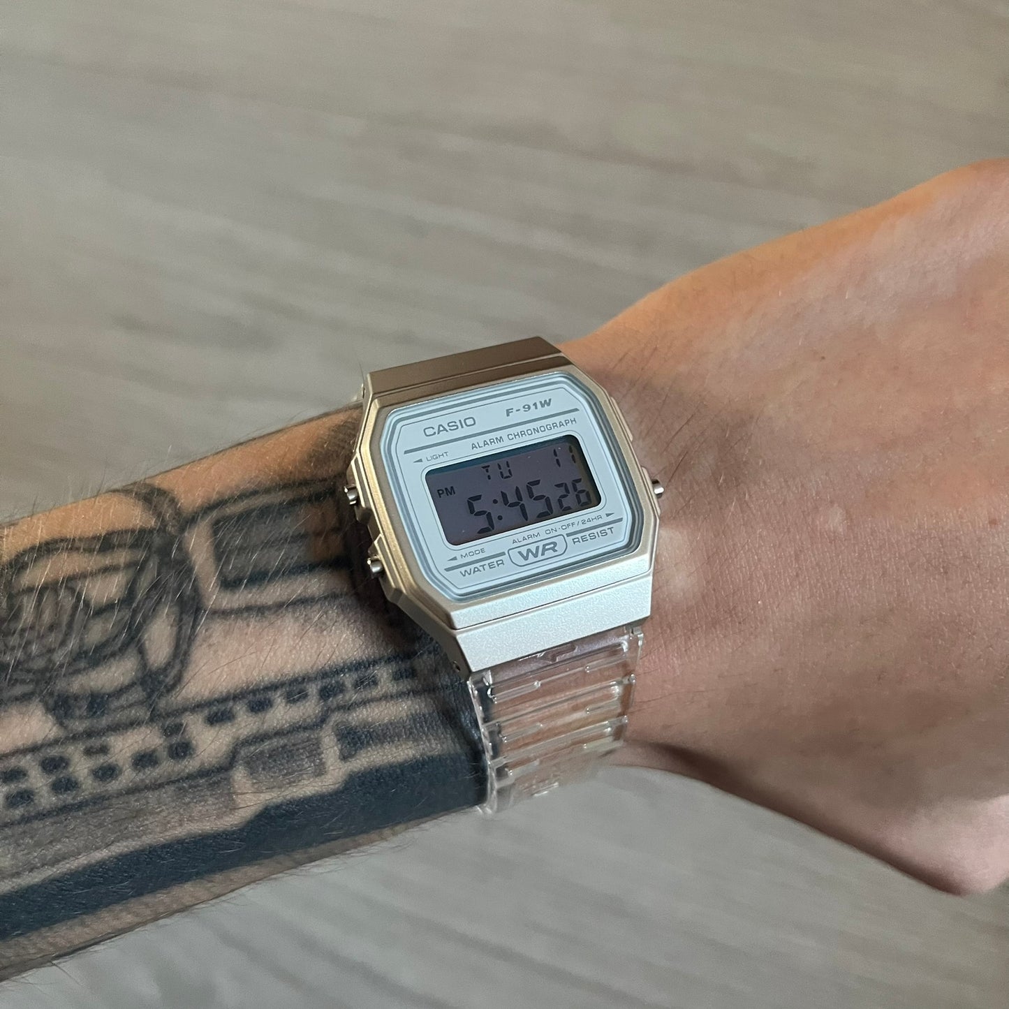 Custom Casio F-91W Clear/Transparent digital watch featuring a Silver reflective filter screen. Slim 8.5 mm profile, lightweight 21 g build and flexible bio-based resin band ensure lasting comfort. Includes alarm, stopwatch, and microlight function for everyday functionality.
