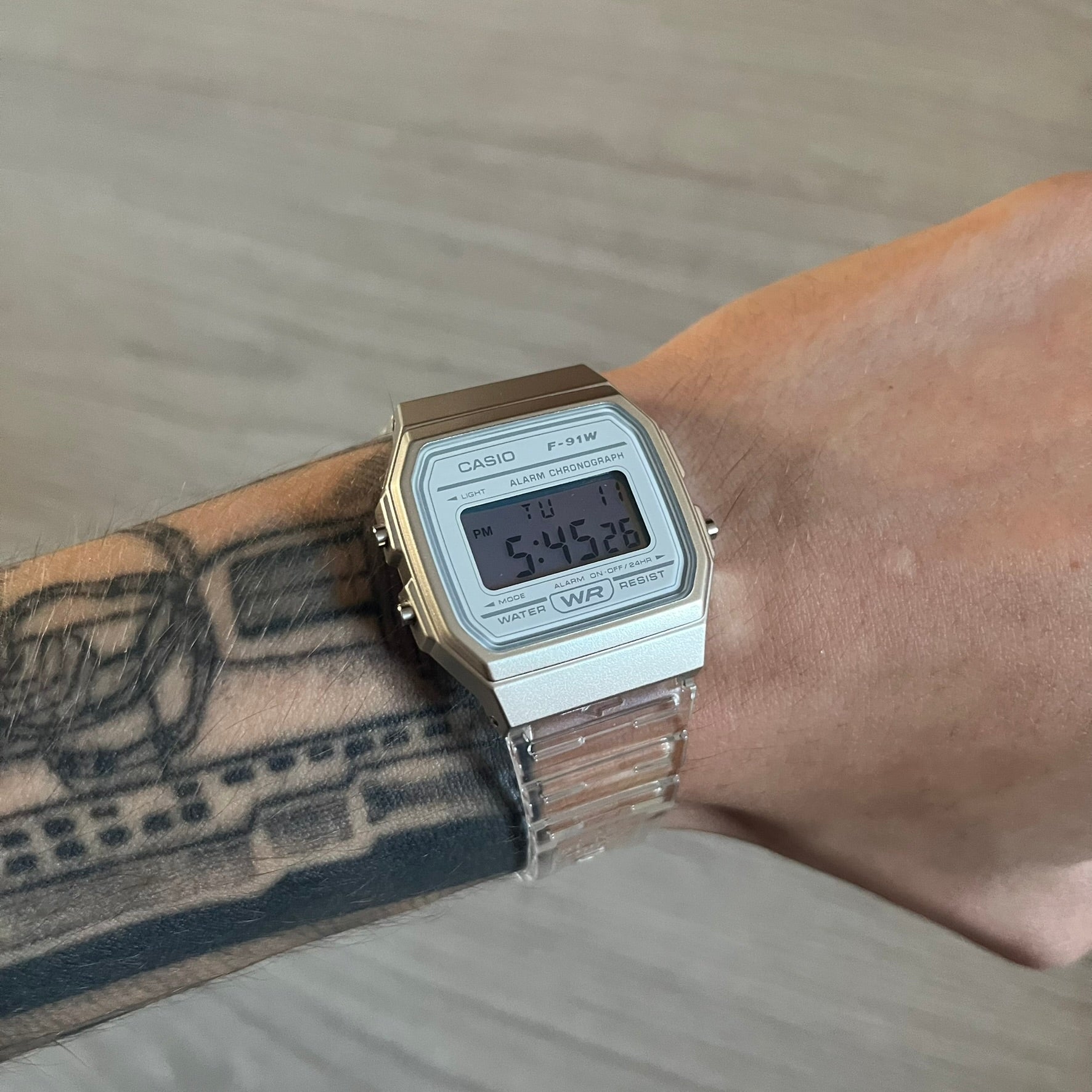Custom Casio F-91W Clear/Transparent digital watch featuring a Silver reflective filter screen. Slim 8.5 mm profile, lightweight 21 g build and flexible bio-based resin band ensure lasting comfort. Includes alarm, stopwatch, and microlight function for everyday functionality.