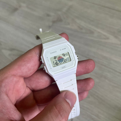 Custom Casio F-91W White digital watch featuring a South Korea flag filter screen. Slim 8.5 mm profile, lightweight 21 g build and flexible bio-based resin band ensure lasting comfort. Includes alarm, stopwatch, and microlight function for everyday functionality.