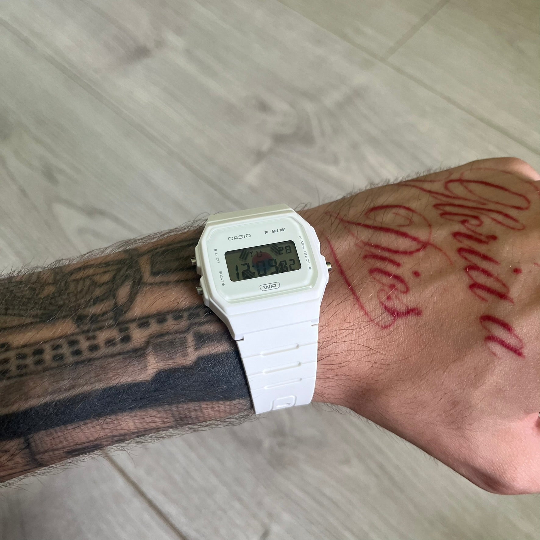 Custom Casio F-91W White digital watch featuring a South Korea flag filter screen. Slim 8.5 mm profile, lightweight 21 g build and flexible bio-based resin band ensure lasting comfort. Includes alarm, stopwatch, and microlight function for everyday functionality.