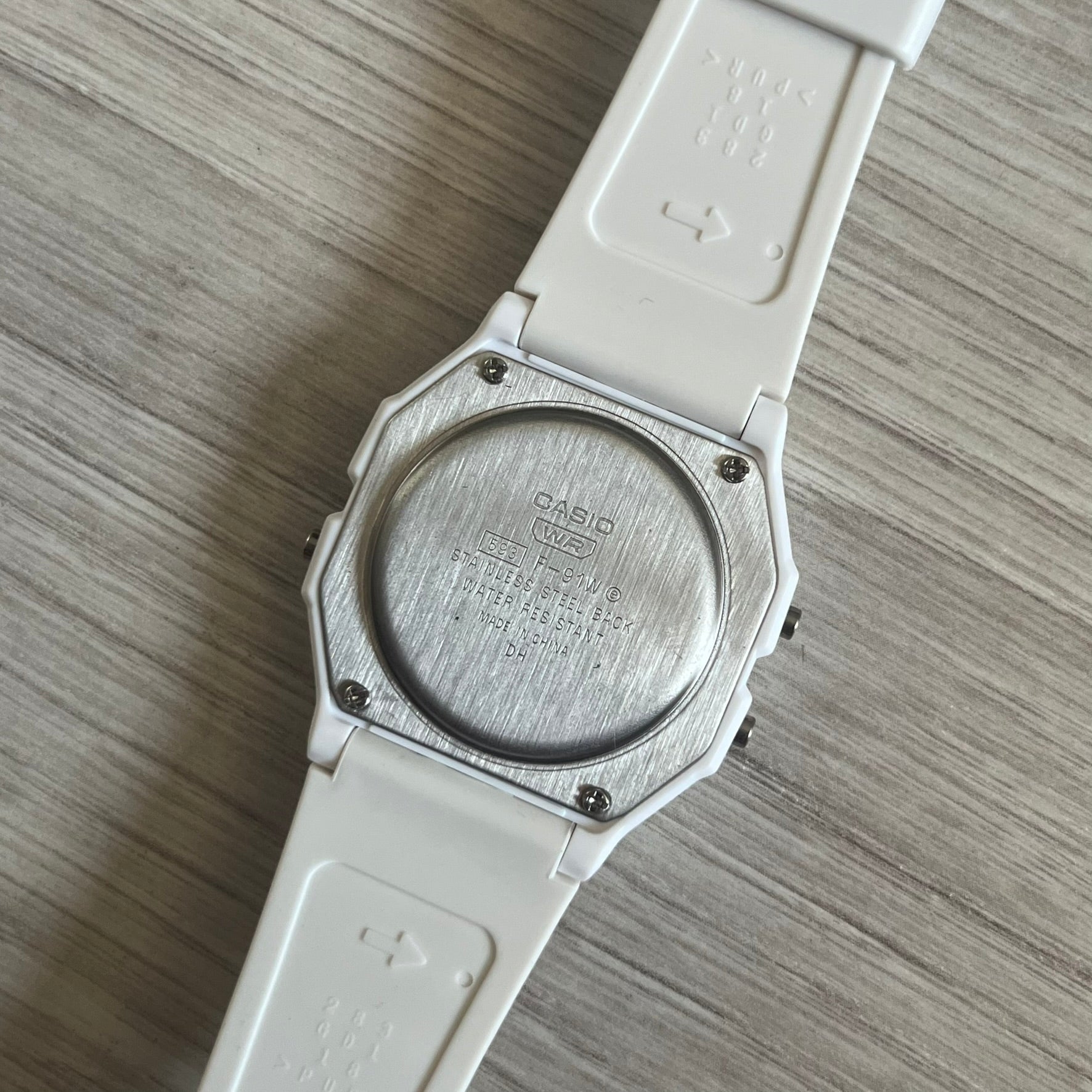 Custom Casio F-91W White digital watch featuring a South Korea flag filter screen. Slim 8.5 mm profile, lightweight 21 g build and flexible bio-based resin band ensure lasting comfort. Includes alarm, stopwatch, and microlight function for everyday functionality.